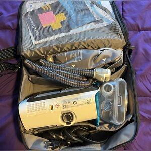 Black CPAP MACHINE Shoulder Bag with machine inside. All accessories included.